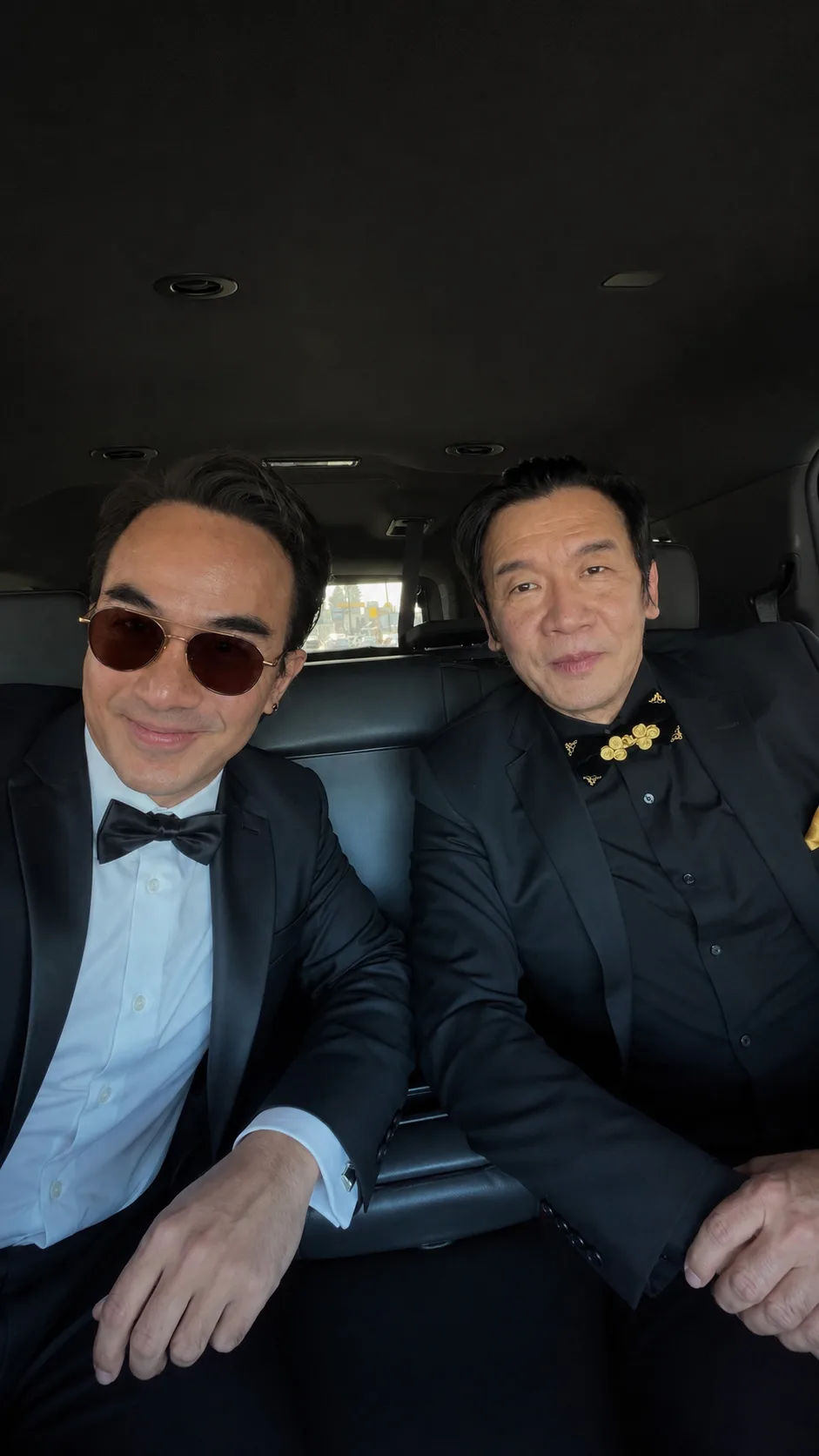 Joe Taslim with Mortal Kombat cast member en route to Gold Gala 2026, wearing a custom Laxmi Tailors bespoke tuxedo
