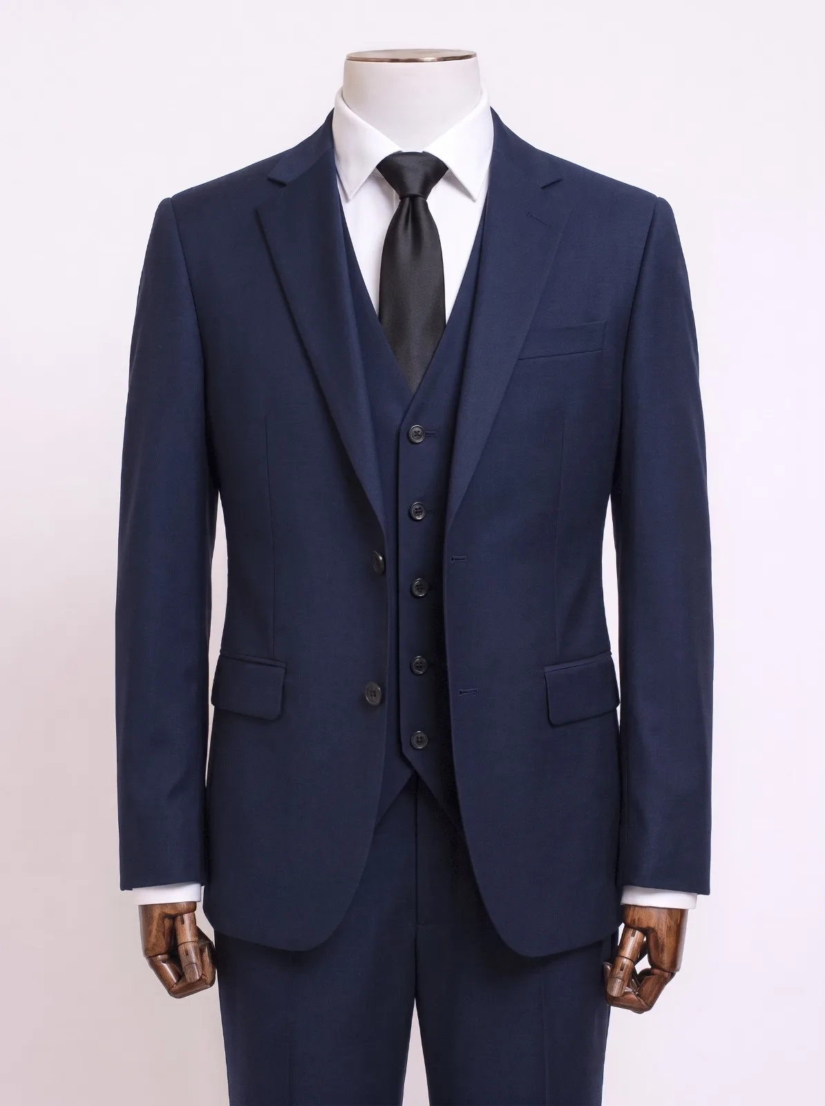 Navy three-piece men's suit, custom made by Laxmi Tailors